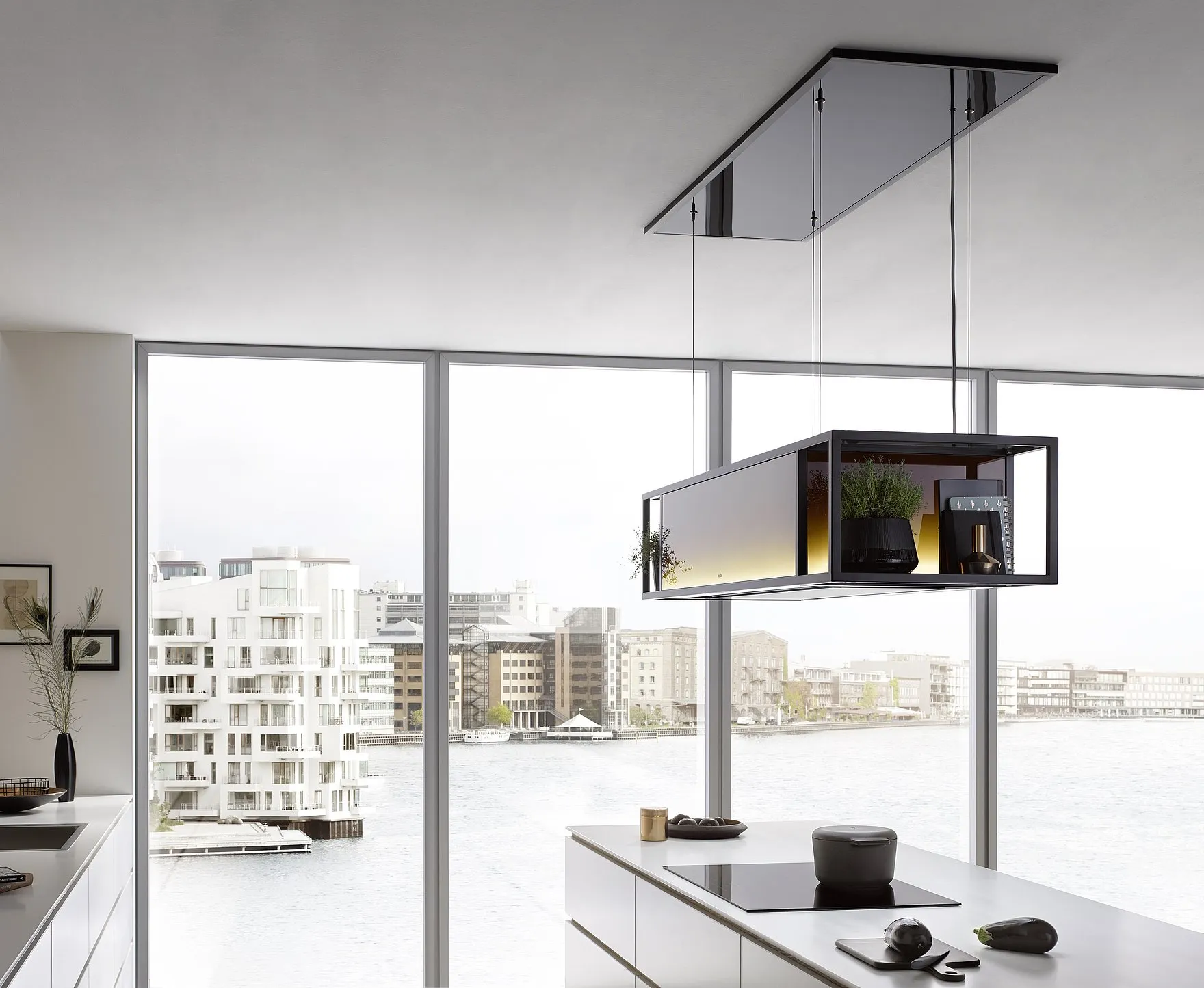 Inselhaube Skyline Frame – Perspektive mit warmem Licht